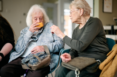 Hilda Hanney and Madeline Mear sharing the scent of soap from Boots memory box.jpg